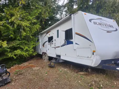 Great trailer that has treated us well. It has the master bedroom part, featuring two little closets...