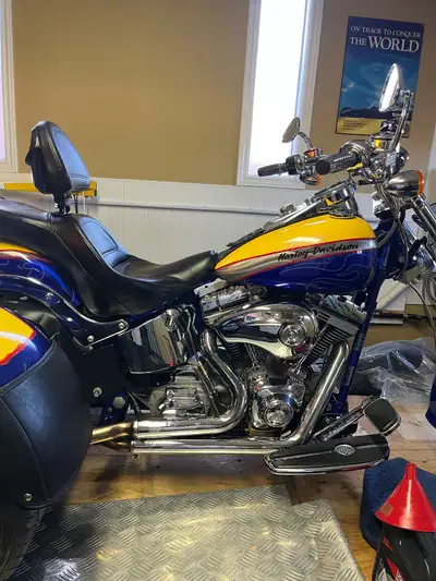 Absolutely stunning Fatboy 103 CI all decked out on custom Trike. This beautiful bike is all service...