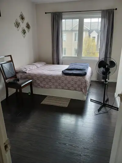 Bright and clean rooms for rent in a well-maintained, quiet home with plenty of natural light and ha...