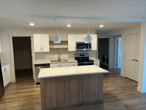 This top floor unit is modern and cozy. The space offers an Air exhcnage adn heat pump to keep you w...