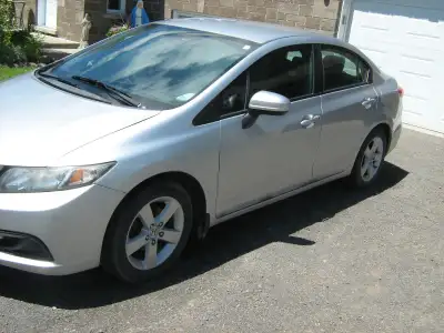 Honda Civic in good condition oil sprayed changed alternator starter battery last year good running...