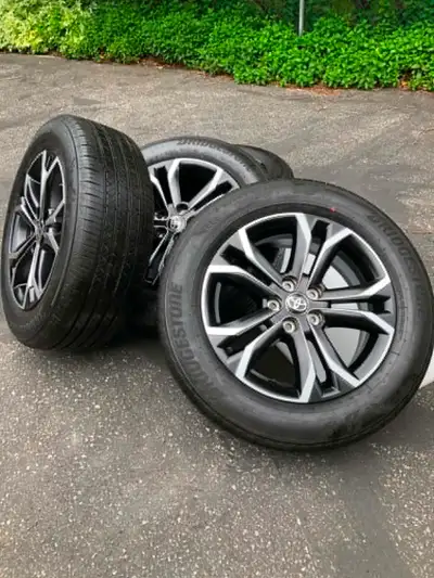 Toyota Sienna Set of four New Bridgestone TURANZA LS100 all season tires on New TOYOTA factory alloy...