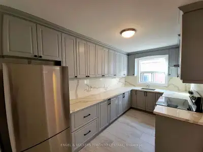 Beautiful Apartment -- Bright, Spacious and Fully Renovated 2 Bedroom, 1 Bathroom Unit. Updated Kitc...
