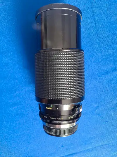 Vivitar series 1, 70-210mm 1:3.5 macro focusing auto zoom lens for Olympus O/OM cameras. Very good c...