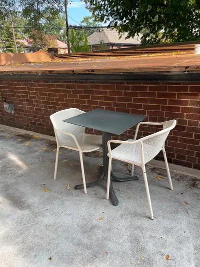 For sale are 21 iron tilting patio tables and 42 iron stackable chairs. Tables are EMU 24” antique i...