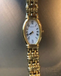 Gold Seiko Watch with Roman Numerals