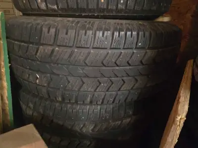 Set of 4 Arctic Claw truck tires off a 2006 GMC Sierra. On steel GM rims, driven 2 seasons, well ove...