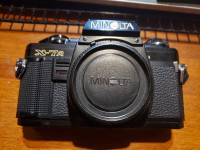 Vintage film Camera Minolta X-7A with accesories & backdrop
