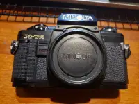 Vintage film Camera Minolta X-7A with accesories & backdrop