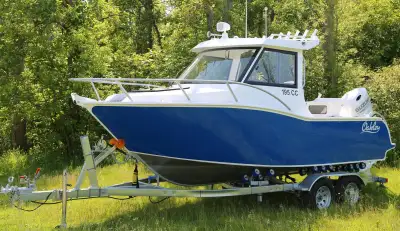 2024 Oakley 19.5 feet, Welded Aluminum Trailer and Suzuki 150hp Outboard. Dealer Demo !! Hard Top wi...