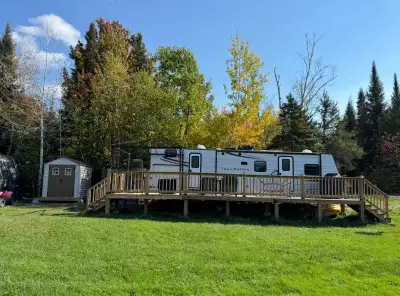 2013 gulfstream trailmaster 32ft travel trailer presently situated at a campground east of Sudbury....
