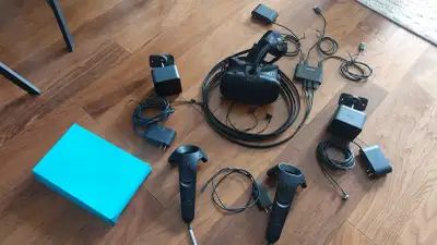 Includes: Headset with cables Ear buds Link box with power supply, HDMI and USB cables 2 controllers...