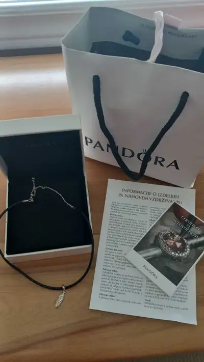 Brand new Pandora leather choker with feather, View more