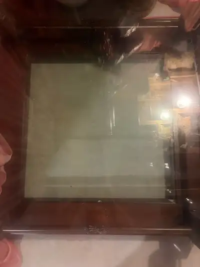 Coffee table from sculpted wood and glass, View more