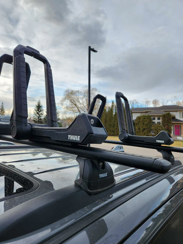 Thule Wingbar Evo roof rack + 2 hull-a-port kayak carriers in Other in Edmonton