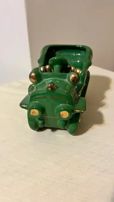 Vintage green jalopy nursery planter, View more