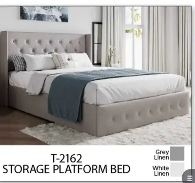 This stylish grey linen storage platform bed features a button-tufted headboard and a convenient sto...