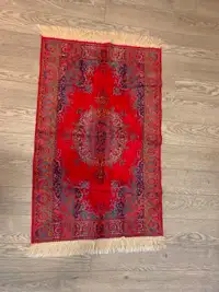 Vibrant red small rug. GUC 42x26