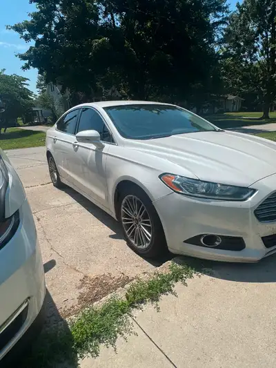 2013 ford fusion 4 door sedan. Runs drives stops power black leather interior power heated mirrors B...