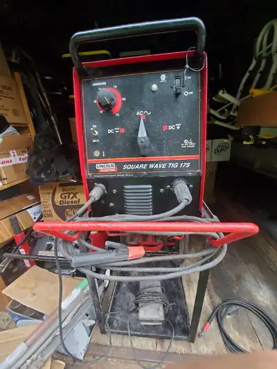 For sale a Lincoln Electric Square Wave Tig 175 Welder and welding cart with at least 150 plus diffe...