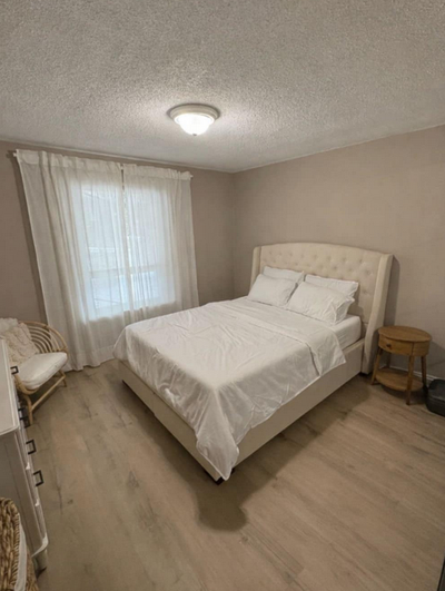 Large private unfurnished bedroom available July 1 in a clean main-floor house in North York, conven...