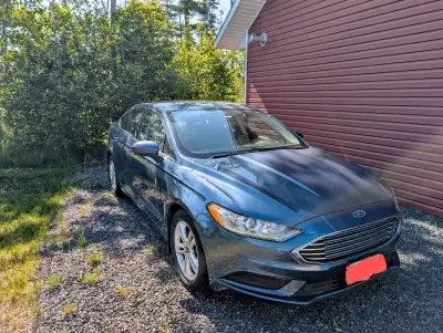2018 Ford Fusion Car is in great condition 125,000km, all highway kilometers Reverse camera Comes wi...