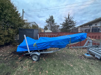  14 foot fibreglass boat with motor and trailer