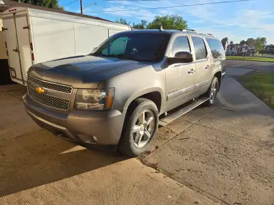 For sale is my 2012 suburban work good has new tires and brakes only reason for selling i need 8 sea...