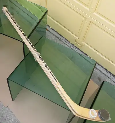 Never used, new in original 2-pack wrapper with hockey puck and an original roll of hockey stick gri...