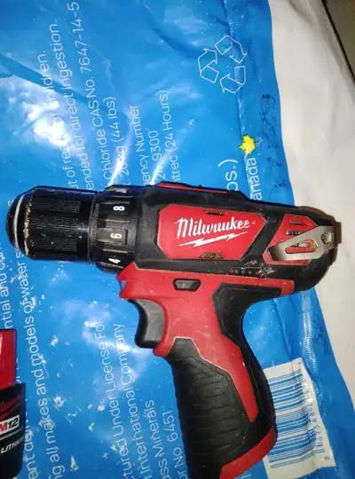 2 Milwaukee drill and compact, View more