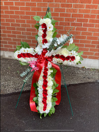 Standing funeral cross with fresh mixed flowers and orchids 34” 