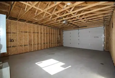 Bright & modern, main floor 2-bedroom suite with oversized (9' door) double car garage. Large front...