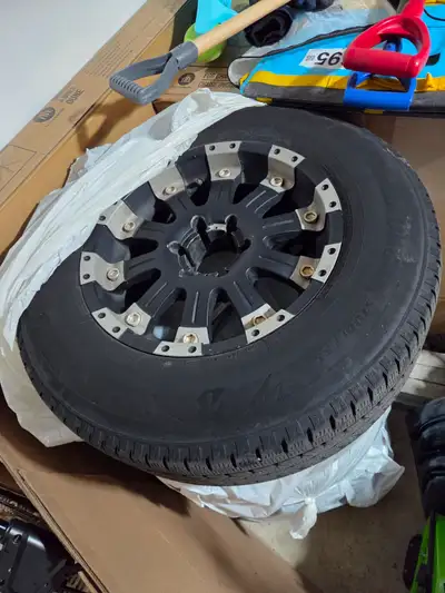 Selling a complete used winter tire and rim package with plenty of tread remaining (see photos for d...