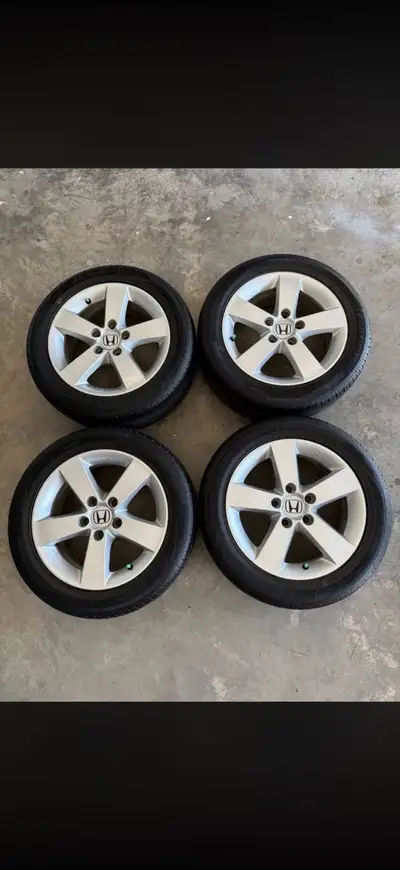 For Sale Honda Civic Rims & Tires, 205/55R16, tires have less than a 1000 kms on them. Rims never se...