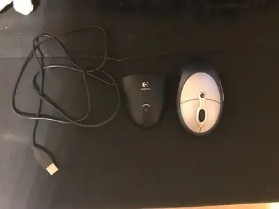 Logitech Cordless Optical Mouse/ RECEIVER, View more