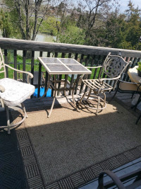 Patio set with two chairs and  table and Lounge Chaise Sunbrella