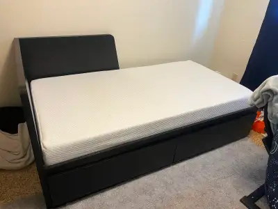 IKEA daybed and mattress. Has two large drawers., View more