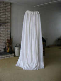 Two Sets of Sheer curtains, 7' 6" in length and 6' 2" in length