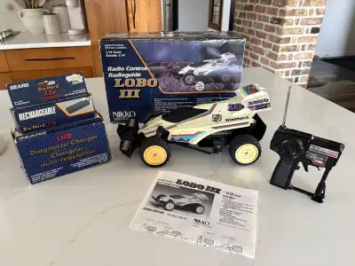 1988 RC car. Complete in box, very hard to find one like this. Stick pack battery was left plugged i...