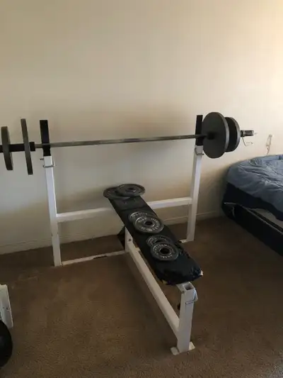 The plates total 155lbs and the bar is 45lbs