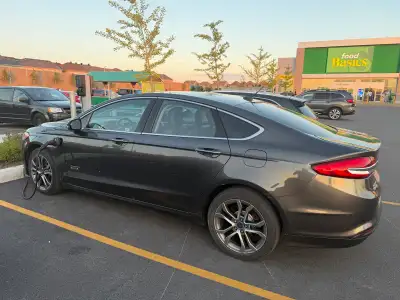 Ford Fusion plug in energi se 2018 Summer tires with OEM rims 18 in. Winter tires with OEM rims 17 i...