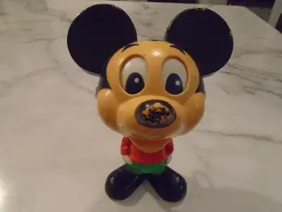 This classic vintage Walt Disney Production Mickey Mouse windup toy is in very good condition with m...