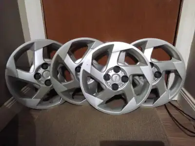 Selling 4 matching Pontiac 4 bolt hubcaps original off of pontiac g5 . Open to offers. Found similar...