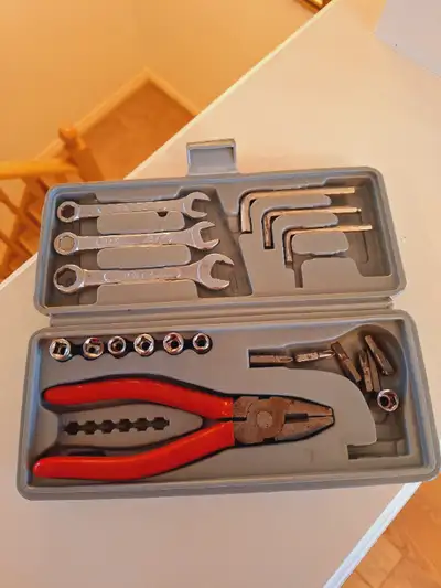 A Tool Box including a Pliers and 3-piece Wrench, Good Condition, View more
