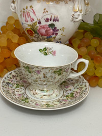 Vintage Mother of Pearl floral tea cup & saucer 