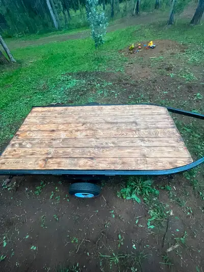 Utility trailer 4.5x 8 brand, new tires, brand new bearings, brand new wood on the deck. 3500 lbs ax...