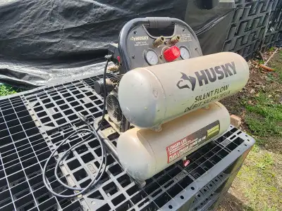 For sale a Husky Ultra Quiet, Silent Flow, 4.6 Gallon Oil-Free Air Compressor, 125PSI, 1 HP, 2.1 CFM...