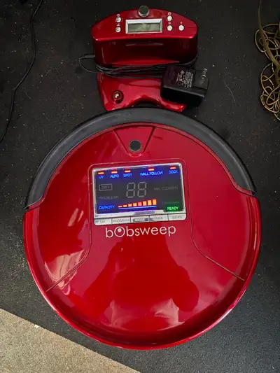 Keep your floors spotless with this pre-owned bObsweep PetHair robotic vacuum, designed to efficient...