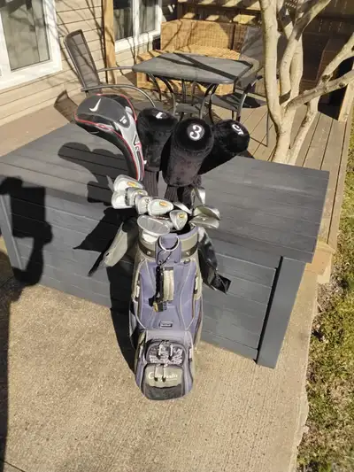 Complete set of right hand Spalding Executive irons and woods, including Nike VR2 Pro S Flex 10.5 dr...
