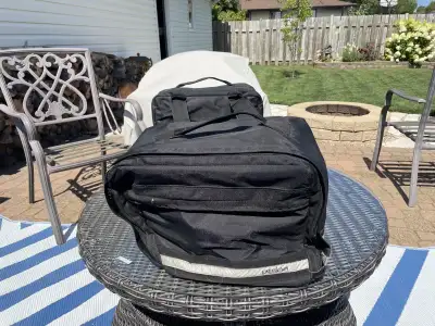 Kimpex. Soft sidedtouring bags in exc condition. The rain covers are included